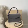 Bolso pequeño cuadrado único, simple y elegante, nuevo bolso casual de hombro y bandolera, bolso de mujer de moda y tendencia para el verano 2026