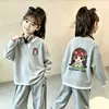Top de punto gofre estilo coreano, imitación de dos piezas, manga larga para niñas, nuevo estilo primavera/otoño para niños medianos y grandes, versátil, elegante, capa base holgada