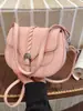Bolso pequeño vintage 2026 nueva moda bolso de hombro de alta gama para debajo del brazo elegante versátil bandolera tipo silla de montar