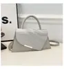Novo Estilo Patchwork Borda Diagonal Verão 2026 Nova Bolsa de Mão Metálica Estilosa Color-Blocking Casual Quadrada Pequena de Ombro para Mulheres