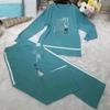 Conjunto de Tricô Bordado de Gola Redonda de Duas Peças para Mulheres Outono e Inverno Nova Moda Suéter Solto Casual Conjunto de Calças de Perna Larga