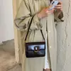 Bolso de hombro nuevo y elegante de comercio exterior 2026, bolso pequeño con sensación de alta gama, bolso cruzado versátil para mujer, tendencia transfronteriza