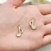 Europa y Estados Unidos transfronterizos sueltan aceite instrumento musical piano guitarra nota aleación colgante creativo diy llavero accesorios de joyería