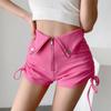 Pantalones cortos con doble cordón y diseño de chica sexy europea y americana, pantalones de mujer de celebridades de Internet, nuevos pantalones cortos ajustados de cintura alta con hebilla de color sólido