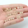 Venta al por mayor de fábrica accesorios para joyería diy pendientes TPE transparentes tapones de cuero anti-caída metal incorporado tapón para la oreja de hamburguesa tapón para pendiente