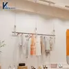 Estante de Exhibición Creativo de Acero Inoxidable y Acrílico de Moda Colgante de Pared para Tienda de Ropa Infantil y Femenina Colgador de Ropa Colgante de Techo