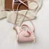Monedero Infantil 2026 Colgante de Gato de Dibujos Animados Mini Bolso de Mano Familiar Lindo Bolso Cruzado de Hombro Semicircular Nuevo