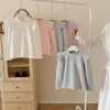 Camiseta básica de manga larga con volantes para niña, nueva para primavera y otoño, cuello medio alto, color liso, top cálido para bebé, ropa de algodón engrosada para niños
