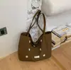 Bolso grande de Shuai Mi Jia para mujer, nuevo modelo de moda 2026, bolso de hombro de nicho para estudiantes, para ir al trabajo y a clase, bolso tote