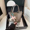 Bolsa de Mão da Marca Donkey Elegante Bolsa Saco Estilosa para Mulheres 2026 Novo Modelo Versátil Elegante Bolsa de Ombro Transversal
