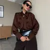 Nova Camisa Ruffled Collar Marrom Escuro Outono/Inverno 2026 para Mulheres, Estilo Europeu e Americano Transfronteiriço para o Dia a Dia, Elegante Top Solto de Manga Longa