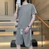 Roupa esportiva de verão camiseta de manga curta plus size conjunto moda masculina duffy bonito um conjunto com senso de design shorts largos vestuário masculino