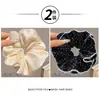 Goma para el pelo tipo scrunchie de encaje con lunares estilo coreano para mujer 2026 Nuevo Modelo de Alta Gama Lazo grande para el pelo Flor de pelo suave Cuerda para el pelo Accesorio para el cabello