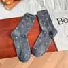 Calcetines holgados de otoño e invierno, amigables con la piel y cómodos, calcetines de media pantorrilla con estampado floral pequeño para mujer, calcetines largos versátiles estilo Ins, calcetines de algodón peinado para mujer