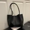 Bolsa Tote Feminina 2026 Modelo Novo da Primavera Ombro Único Design de Nicho Tendência Grande Capacidade para o Dia a Dia Bolsas Femininas Personalizadas