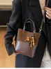 Bolsa Pequena Fosca Retro Transfronteiriça para Mulheres Outono e Inverno Versátil 2025 Nova Bolsa de Ombro Transversal Popular Estilo Quente Bolsa Saco