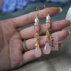 Aretes de cristal rosa natural estilo chino nuevo capullo de flor de magnolia Hanfu estilo antiguo aretes cheongsam clip de oreja con temperamento retro gancho de oreja para mujer