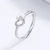Explosiones de网红 alta imitación arena Oro nuevo diseño de nicho simple tridimensional doble amor apertura anillo femenino venta directa de fábrica