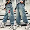 Z1168-niños Yang tempranos primavera 2024 nuevo bolsillo trasero bordado jeans de moda niños medianos y grandes pantalones largos moda