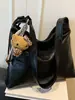 Bolsa de mano casual estilo coreano transfronteriza para mujer, nuevo modelo otoño 2026, bolso de hombro casual, bolsa cruzada de gran capacidad