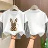 Camiseta de manga larga de algodón puro para niña para primavera y otoño 2026, top base con look en capas para niños, elegante top con estampado de dibujos animados para niña pequeña