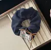 Gravata Borboleta de Letra Estilo Coreano Scrunchie de Bolinhas Cor Café Versátil Simples Prendedor de Cabelo Feminino Acessório de Cabelo Atacado Novo Modelo