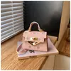 Bolso de lunares estilo coreano para niñas pequeñas, con un adorable charm de oso de peluche, un nuevo minibolso cruzado para bebés y niños
