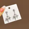 Pendientes Metálicos de Aguja Plateada con Forma de Corazón y Estrella de Ocho Puntas, Pendientes Europeos y Americanos de Nicho con Forma de Estrella, Pendientes de Chica Popular Estilo Dulce y Fresco al por Mayor