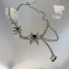 Colar Borboleta Doce e Cool com Tassel Líquido Escuro para Mulheres, Design de Nicho de Alta Qualidade, Corrente de Clavícula Exquisita e Versátil, Cool e Estiloso