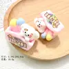 Color sólido tres dimensiones dibujos animados pequeño perro de leche resina accesorios pegamento de crema colgante diy adornos de micro paisajismo decoración de flor de zapato lote