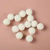 Fábrica de Origen Rojo Ciruela Profundo Poliéster Alta Elasticidad Pompones Accesorios para Ropa y Juguetes DIY Admite Pedidos Personalizados y Venta al por Mayor