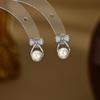 Primavera y verano nuevos aretes de lazo de diseño de moda coreana de plata S925, exquisitos aretes de perlas para oficina