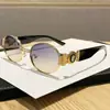 2026 Nuevas Gafas de Sol Metálicas con Montura Pequeña Ovalada para Belleza de Cabeza Unisex Tendencia Genial Estilo Europeo y Americano Gafas de Sol de Celebridad de Internet