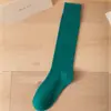 Calcetines finos de color liso para primavera y otoño, calcetines largos tipo JK hasta la pantorrilla, a la moda, sencillos, combinan con todo, absorbentes de sudor, calcetines de compresión hasta la rodilla universitarios para mujer, al por mayor