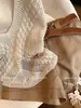 Chaleco de Punto Sin Mangas con Cuello en V Hueco de Avena Falso Dos Piezas para Mujer Verano 2026 Nuevo Estilo Old Money Temperamento Top Adelgazante