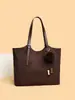 Bolso de mujer retro de color liso muy vendido, modelo nuevo 2026, bolso de hombro de alta gama, bolso tote de gran capacidad, bolso de moda para el día a día