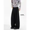 Marca europea y americana de moda, pantalones rectos elegantes y únicos para hombre con un diseño único, estilo americano de alta costura, pantalones casuales anchos, holgados y con caída.