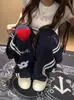Calça Esportiva Bordada com Coração e Flor Estilo Streetwear Americano para Mulheres Verão 2025 Cintura Elástica Reta