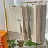 Wangpo 8650 Outono e Inverno Algodão Penteado Conjunto Térmico Casual Simples Cor Lisa Manga Longa Calças Gola Redonda Roupas de Outono e Calças Longas para Mulheres