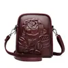 Bolsa feminina transfronteiriça com design de rosa em relevo vintage de alta qualidade, porta-celular, porta-moedas, textura estilosa, bolsa de ombro para mães de meia-idade