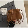 Bolso bandolera tipo cubo de moda versátil transfronterizo para mujer, bolso de mano casual vintage para el trabajo, nuevo bolso de hombro popular 2026