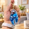 Llavero Creativo Portátil con Colgante Líquido del Mundo Marino, Juguete Delfín de Arena Movediza para Alivio del Estrés, Regalo de Cumpleaños