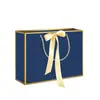 Bolsas de Papel con Moño de Regalo en Stock para Comercio Exterior y Compras Transfronterizas, Personalizables con Impresión de Logo, Envío Gratis
