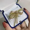 Accesorios DIY Chapado en Oro Grueso Zirconia Microincrustada Elegante Lazo Broche de Perla Pin Accesorios de Moda Portaflores Vacío