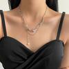 Collar con borlas de perlas de circonita y costuras irregulares para mujer, diseño de nicho, estilo frío, elegante cadena de clavícula de alta calidad.
