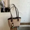 Bolsa tote minimalista de grande capacidade, nicho de moda estilo coreano, novo modelo 2026, bolsa de ombro e transversal de alta qualidade