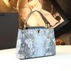 2026 Nuevo Bolso Cubo Exquisito de Moda, Bolso de Mano de Piel Genuina de Lujo Ligero con Estampado de Serpiente, Nuevo Bolso de Hombro Cruzado de Moda
