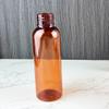 Venta directa de fábrica, 24 unidades, 100 ml, botella redonda con hombros, loción en aerosol marrón, tónico, embalaje de viaje, color marrón mascota.