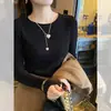 Camiseta básica de punto de color liso para mujer, ajuste ceñido para primavera y otoño, nuevo suéter elegante 2025 con cuello redondo, adecuado para usar en capas o como prenda exterior