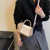Bolso pequeño cuadrado de moda estilo coreano para mujer, nuevo modelo principios de otoño 2026, bolso de hombro moderno de bloques de color, bolso casual de alto valor para mujer